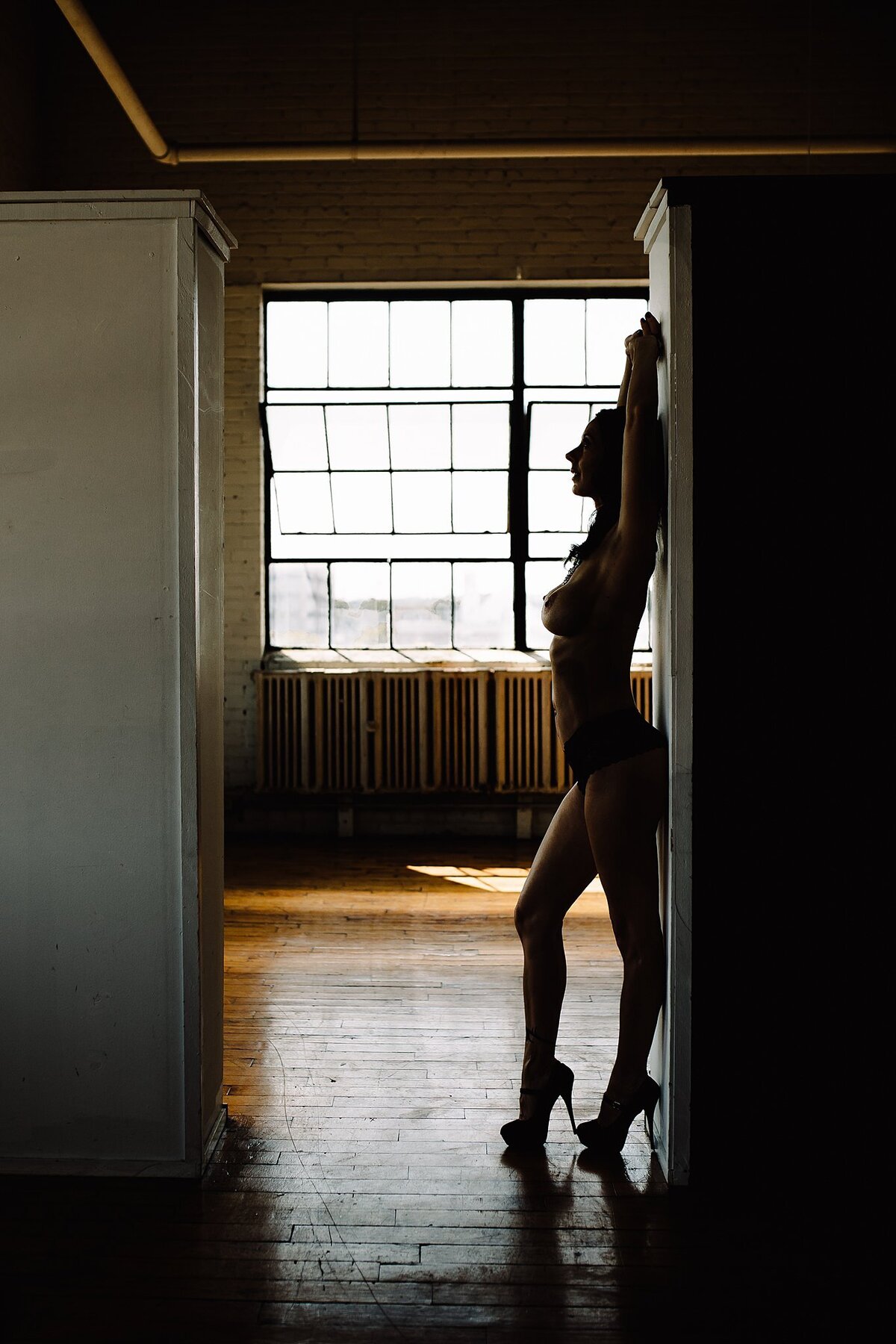 silhouette of girl in doorway