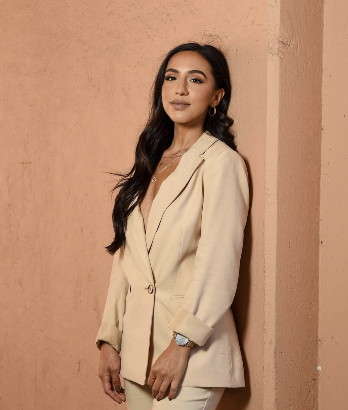Portrait of the founder of The Complexion Club, a skincare club offering personalized treatments and a wellness experience, as showcased on their aesthetic-forward website.
