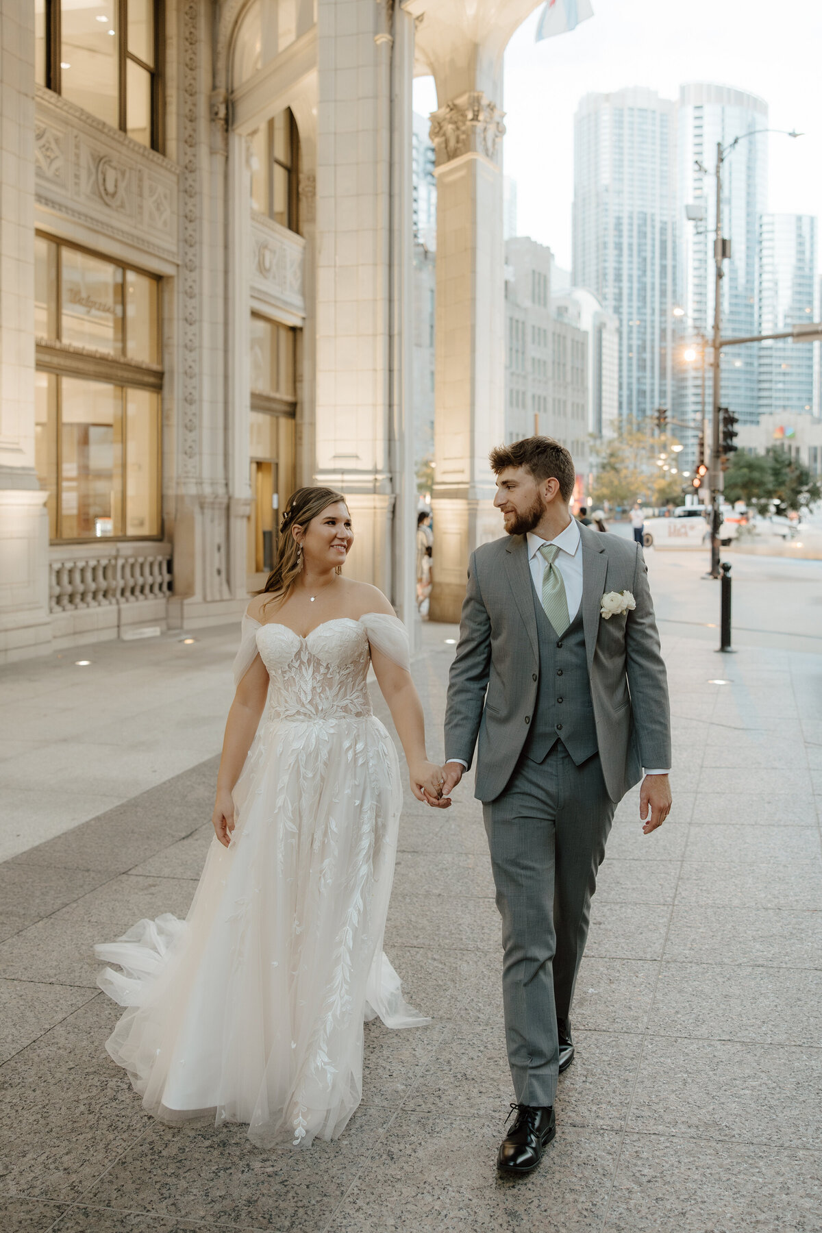 bride-groom-walking-streets-of-chicago-meg-pearson-photography-midwest