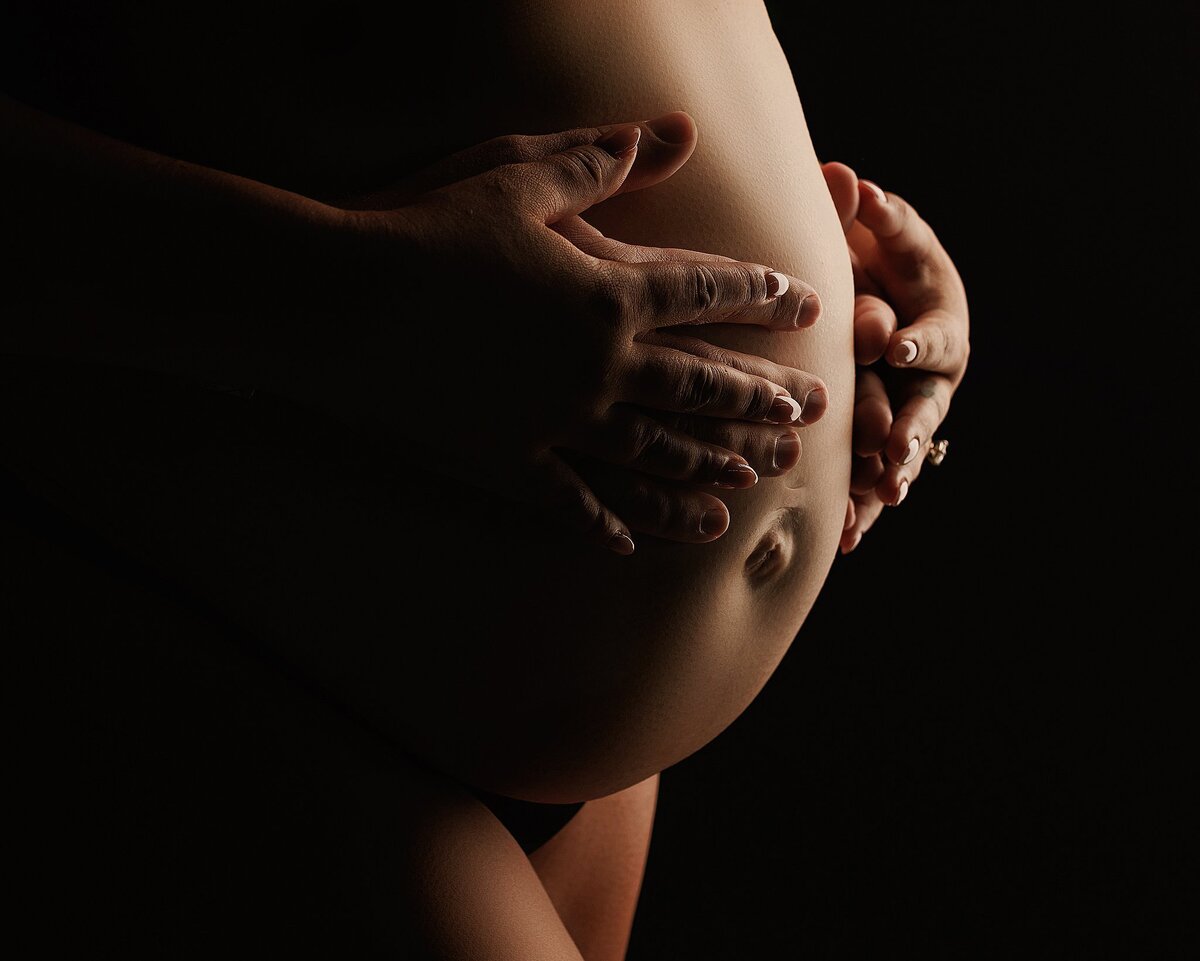 couples hands on belly maternity photo