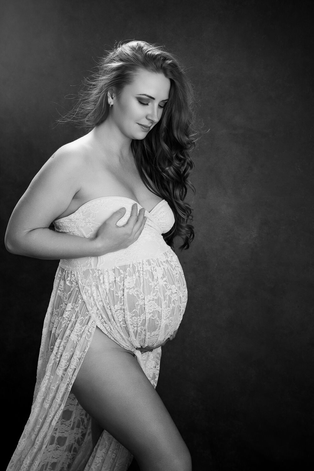 elegant maternity portrait showcasing graceful femininity in Austin