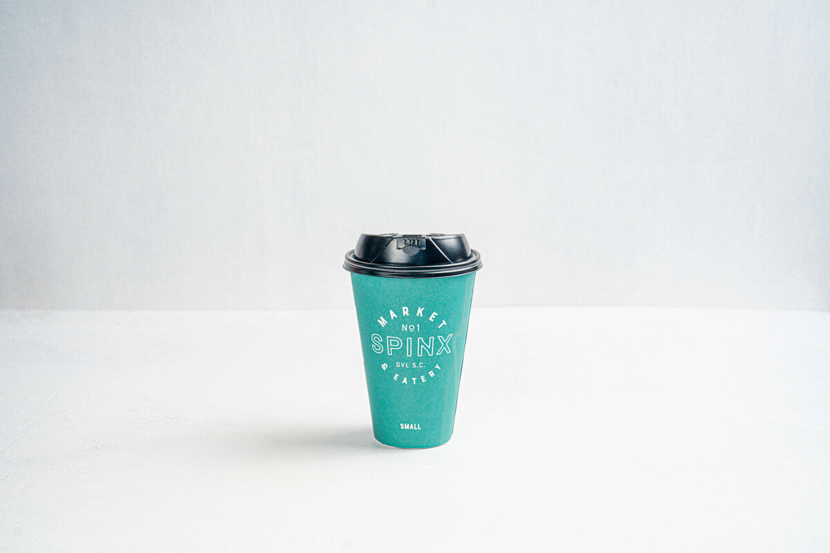 Product photography in Greenville, SC featuring Spinx coffee cup