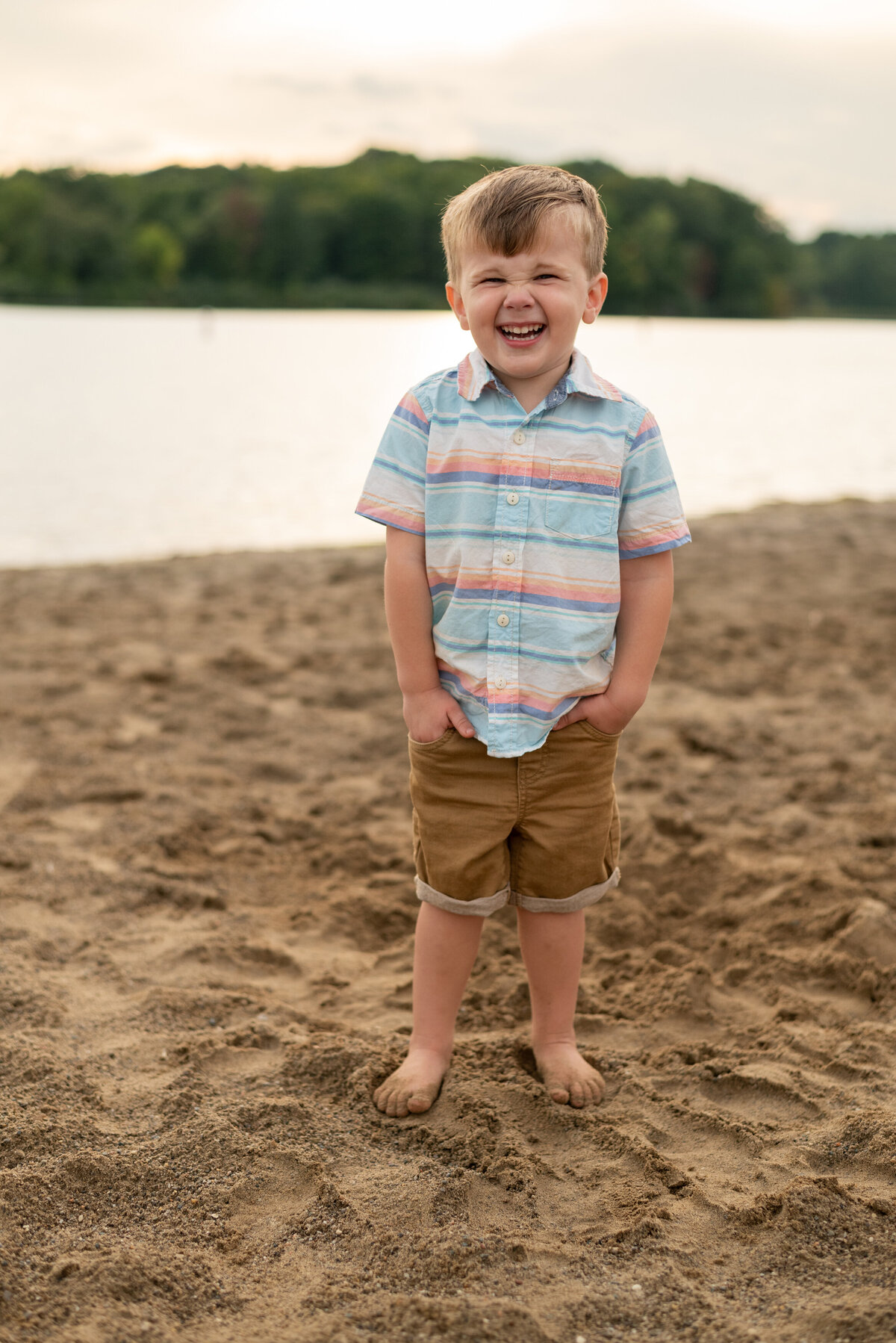 boy-laughing-near-water