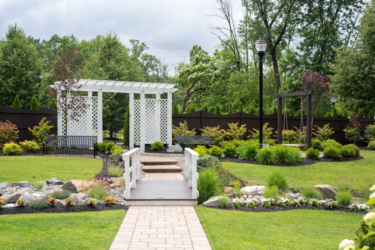 the garden bridge and swing area at the hamilton manor nj