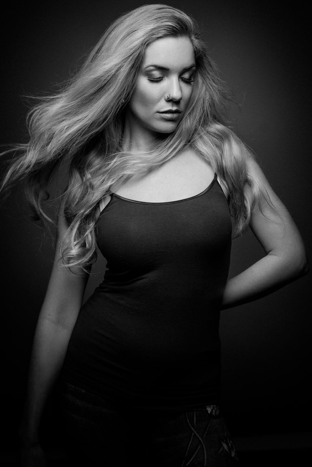 High-contrast black and white boudoir image taken in Austin studio