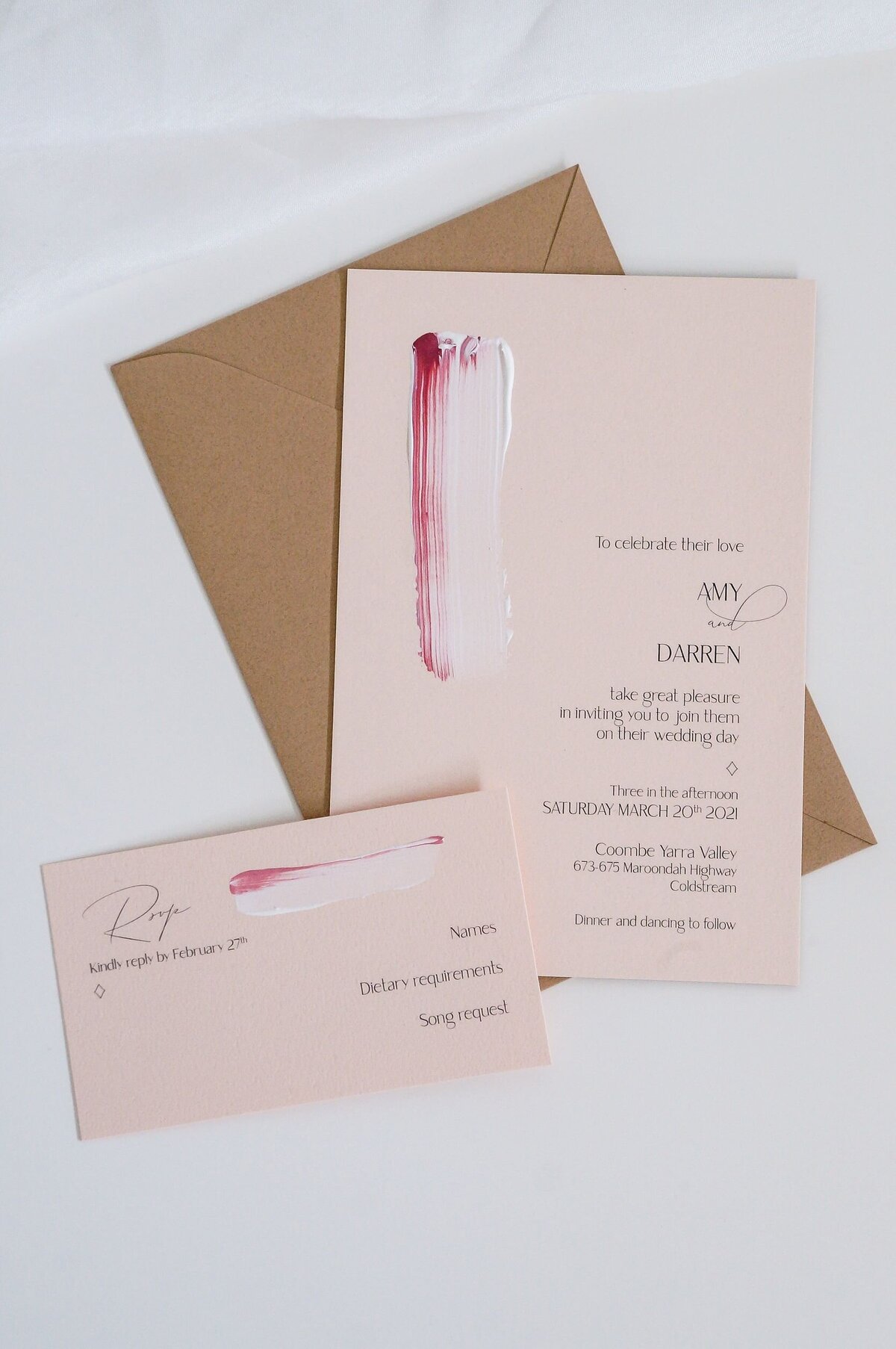 Pink and caramel painted artistic wedding invite with caramel brown envelope