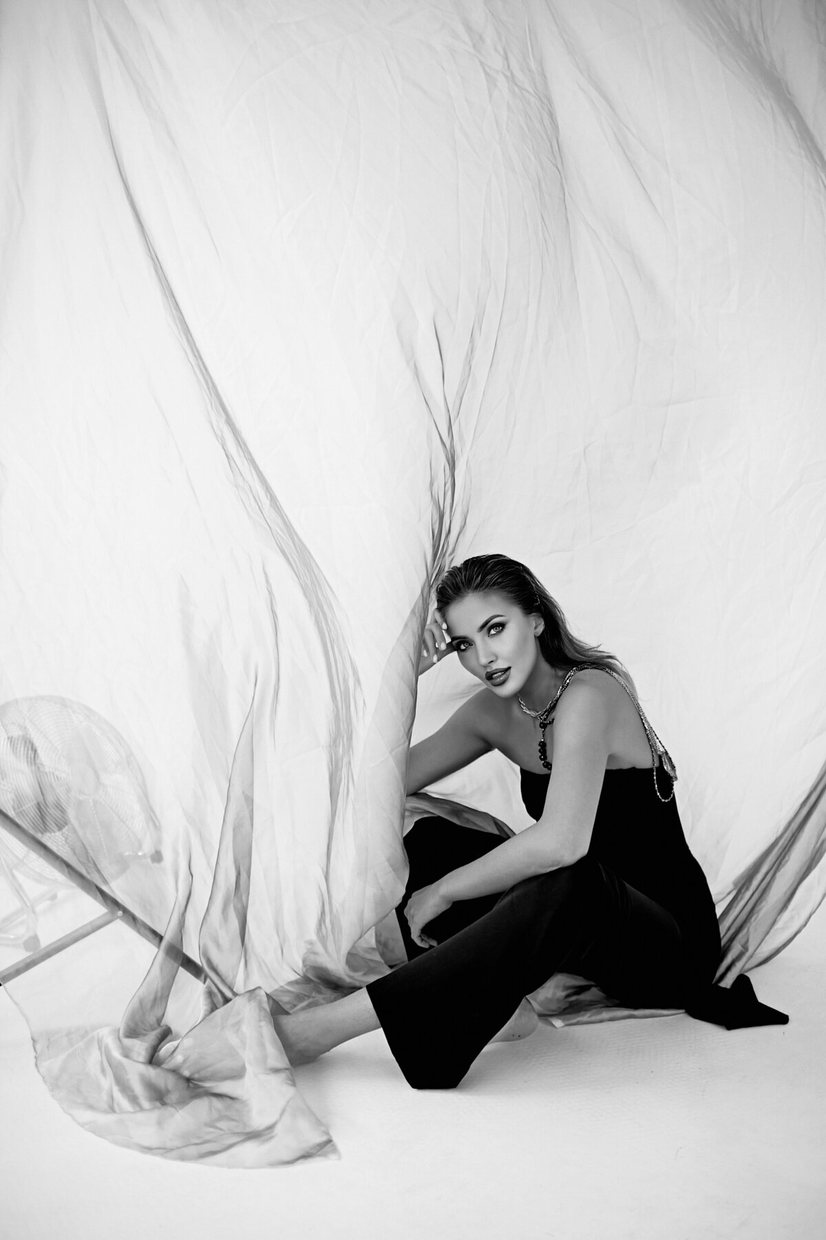 professional-model-sitting-floor-fashionable-dress-makeup-hairstyle-pretty-face-white-sheet-is-waving-magazine-cover (1)