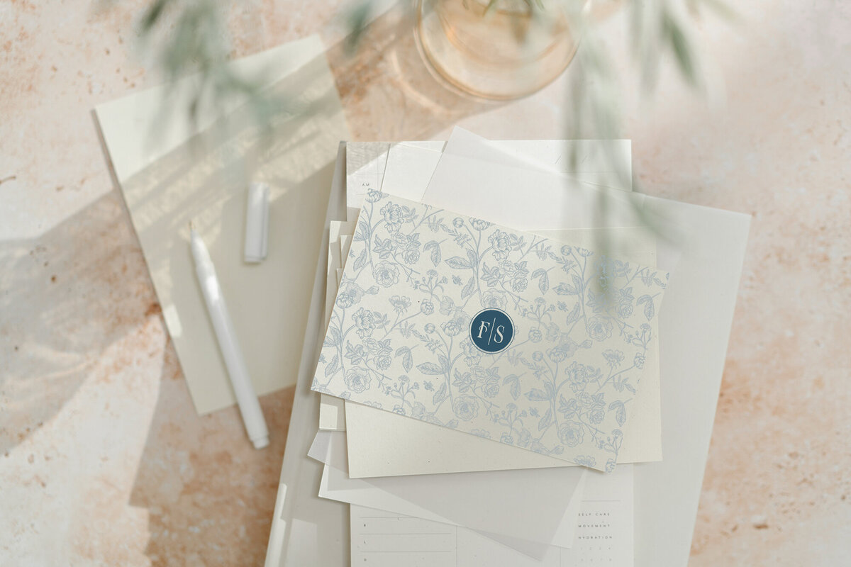 Stack of stationary with elegant florist branding
