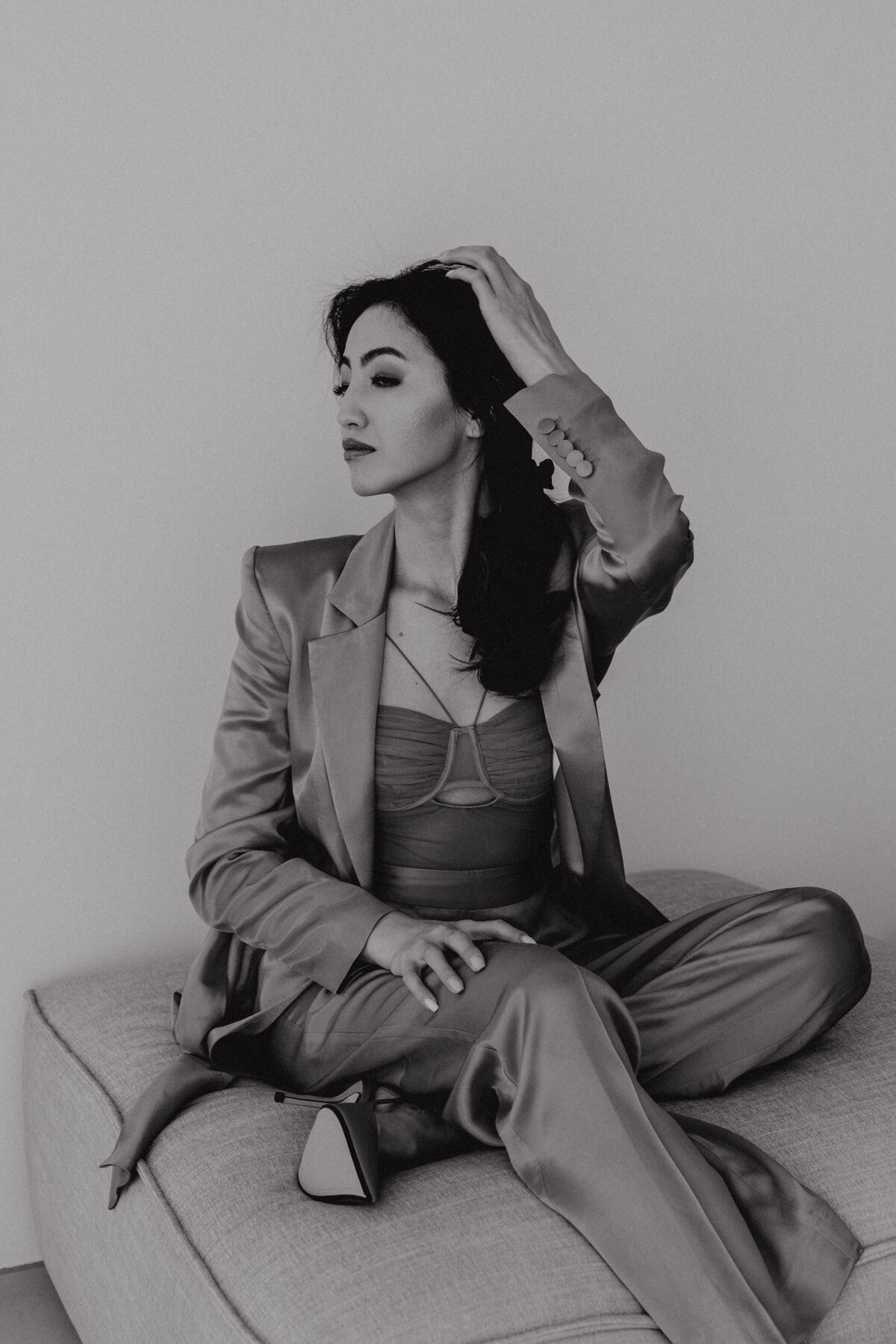 kaboompics_elegant-asian-businesswoman-in-satin-suit-focused-on-laptop-work-elegant-asian-businesswoman-in-satin-suit-focused-on-laptop-work-32079