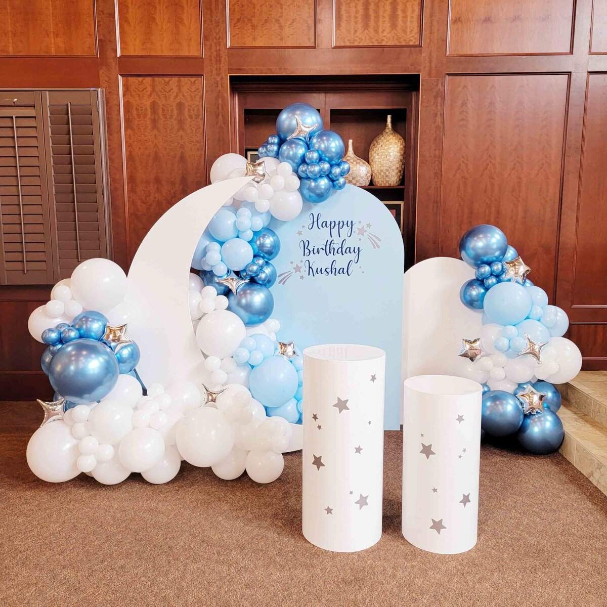 The magic of the night sky to your boy's celebration with air with flair decor custom balloon installation, featuring moon and stars enchantment. The custom-designed brilliance of our balloon artistry