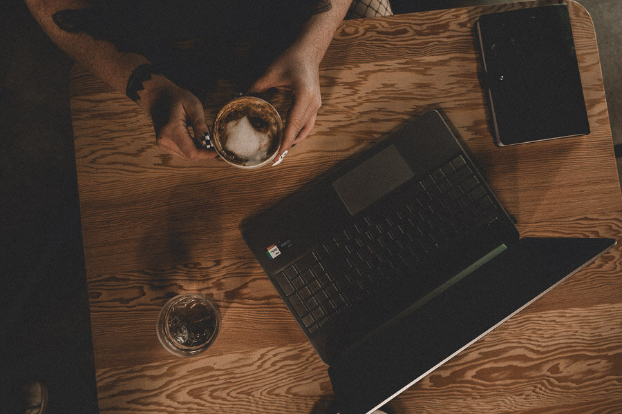 Moody photo of laptop to show how Dani VanDusen got started in copywriting