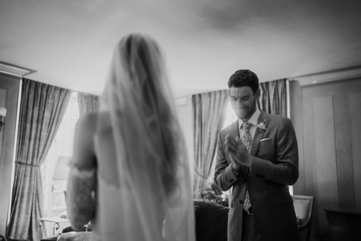 groom and bride first look at borgo santo pietro exclusive wedding 
