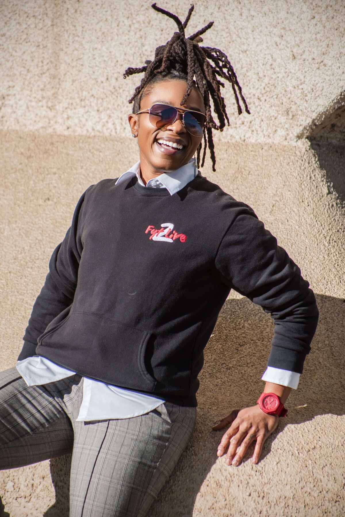 Contemporary portrait photography by D3D Photography capturing young person in casual streetwear with sunfglasses and natural lighting