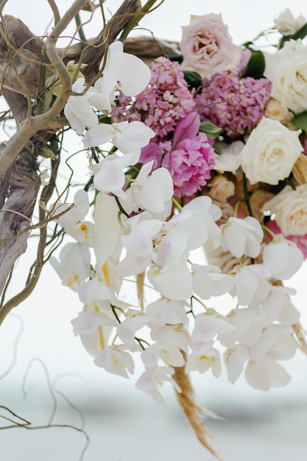 A dreamy floral centerpiece complementing Brenda & Stephen’s romantic Cheeca Lodge wedding decor.