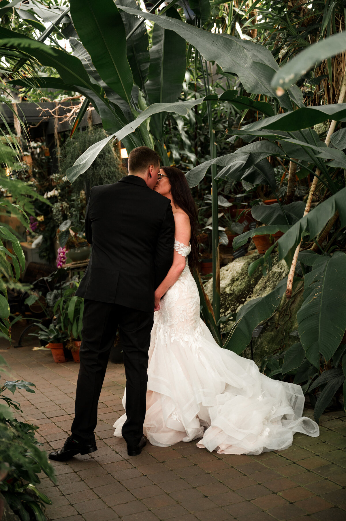 bride and groom kissing on their wedding day