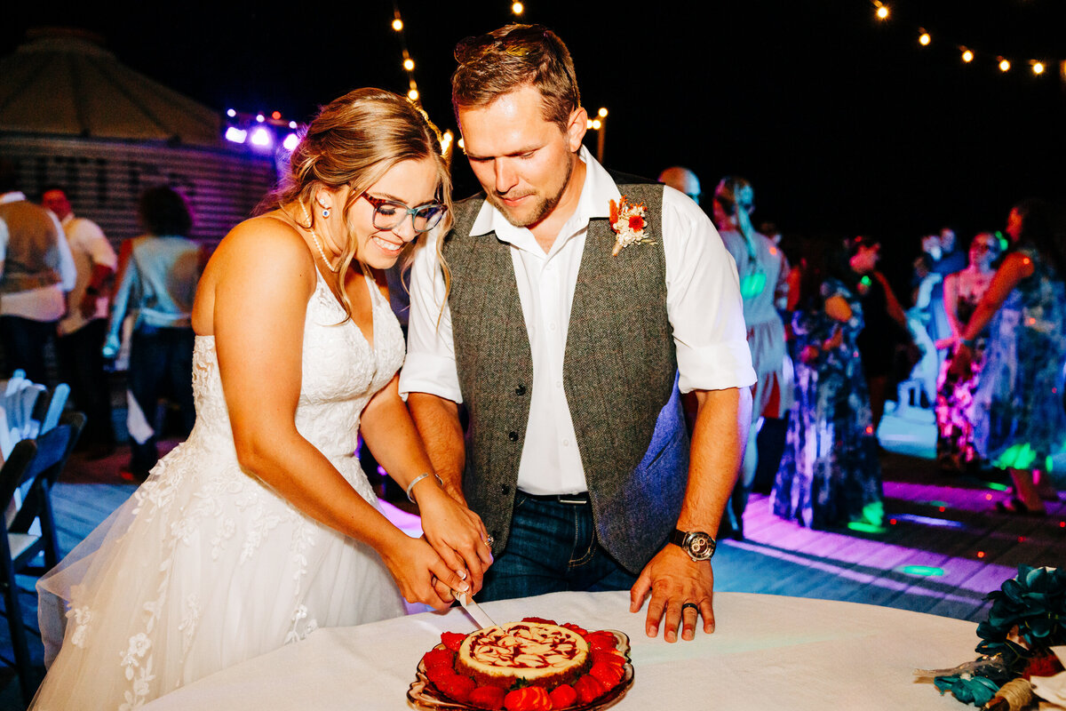 Bride and groom cutting cake at Cattle Springs in Arlee, MT