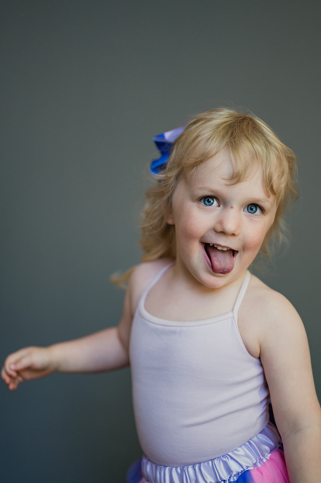 Outdoor fine art school portrait of a child smiling, taken in the Berkshires