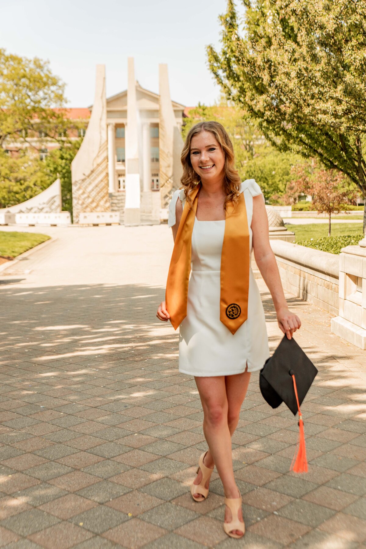 Girl college graduate hired photographer to capture life event