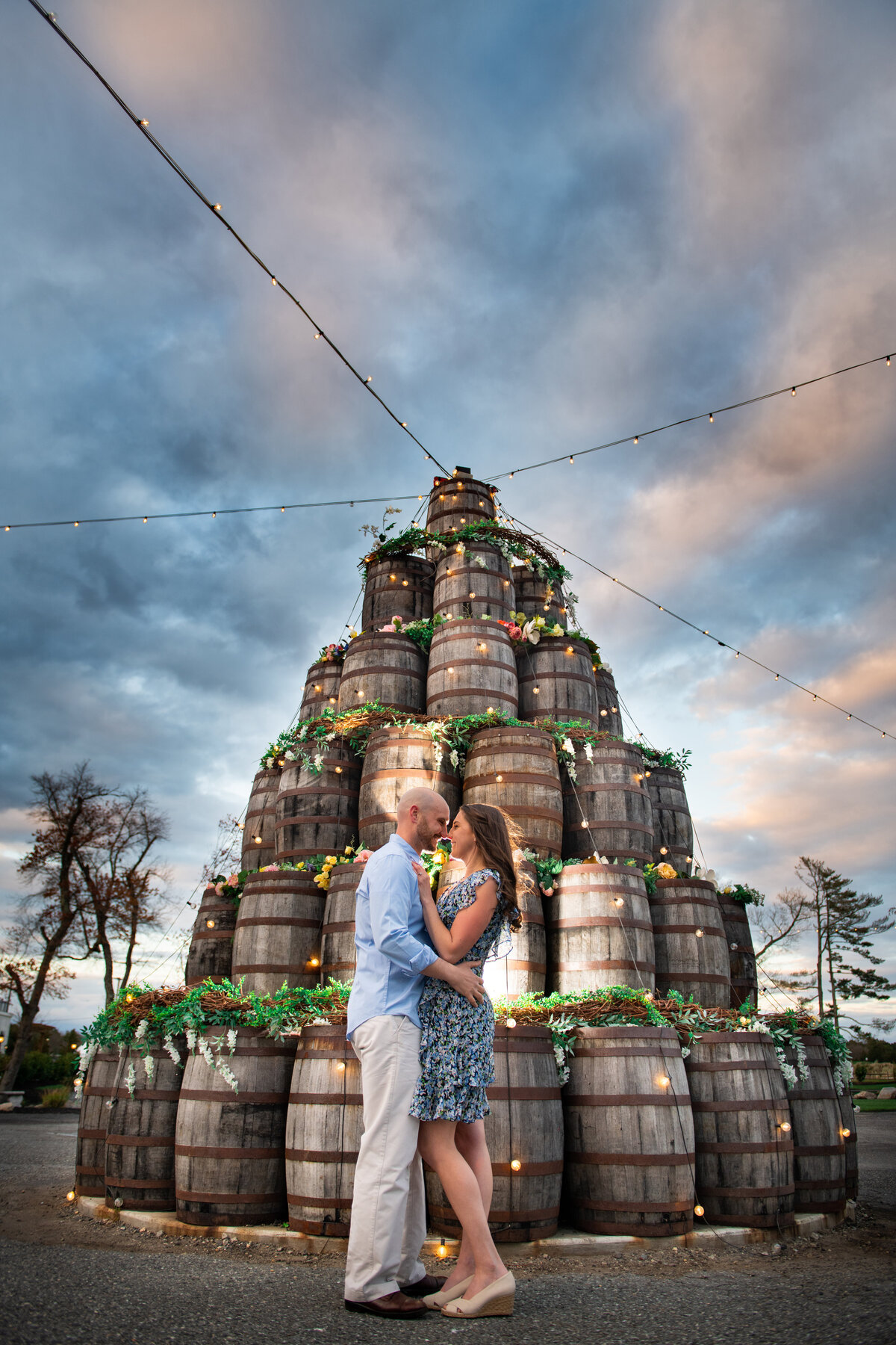 happy_engaged_couple_stealing_kiss