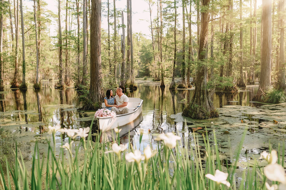 Couple paddles around Cypress Gardens during their Engagement Session at Cypress Gardens.