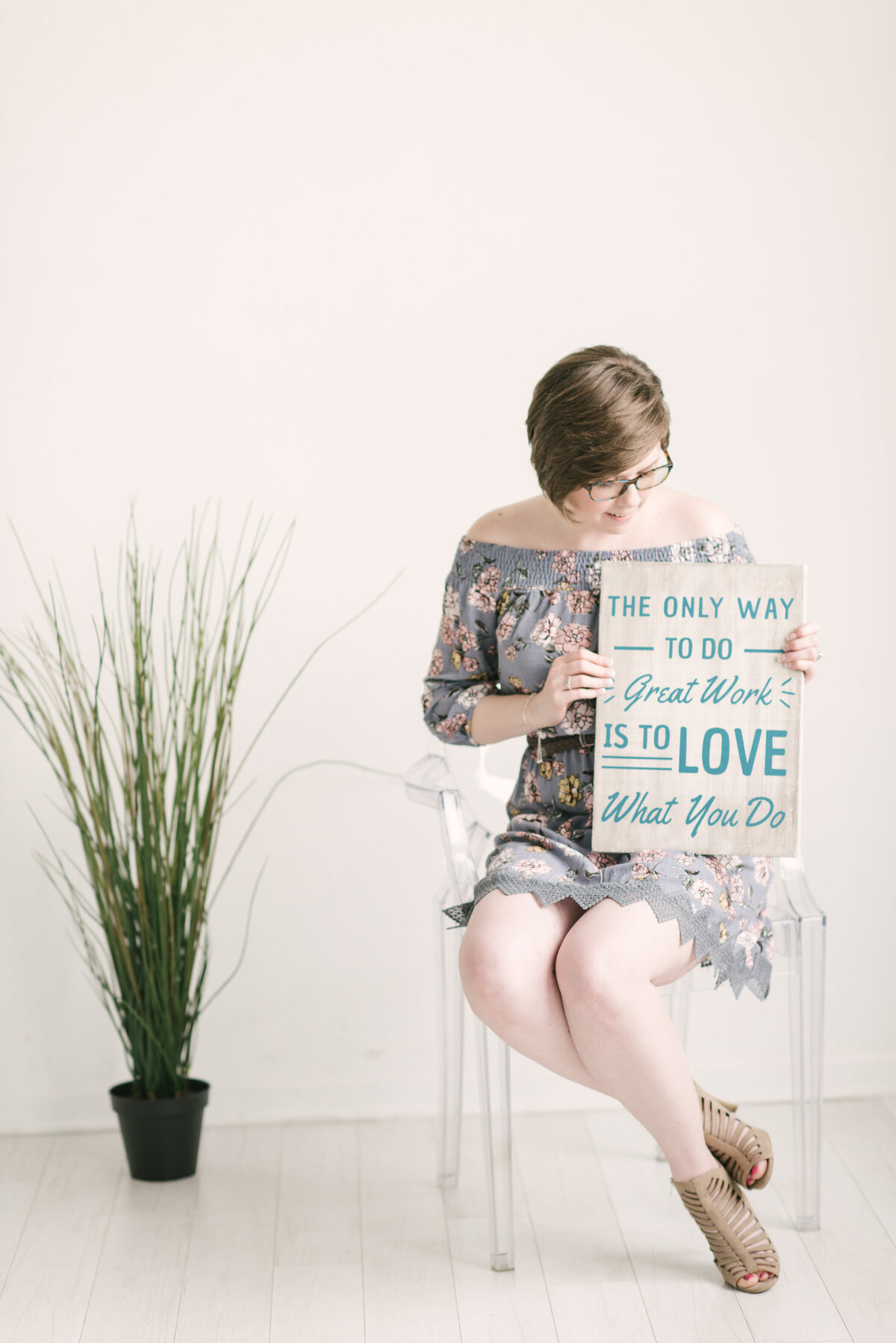 Courtney holding sign at Fort Worth Wedding Venue