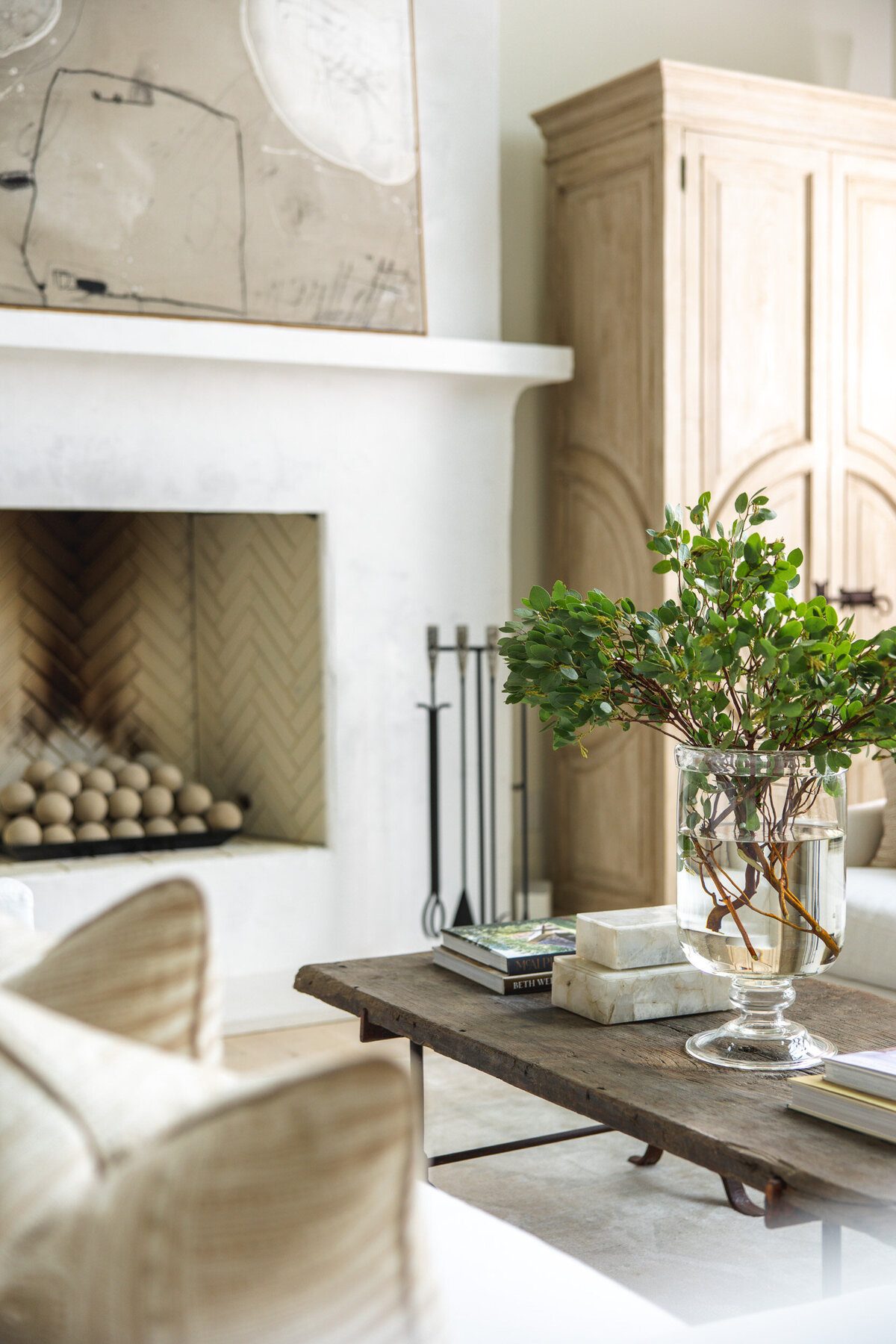 Fireplace with creams and neutral furnishings