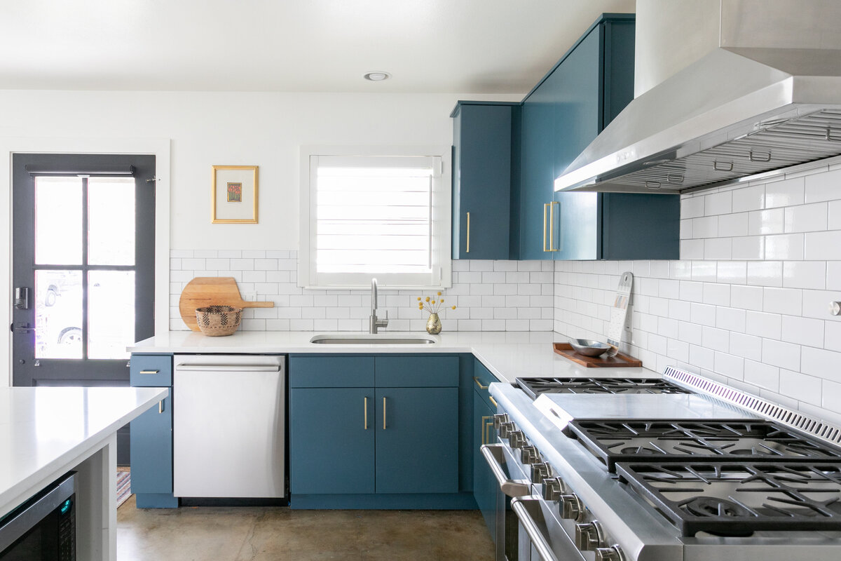 hello-home-austin-teal-kitchen-remodel-open-layout-semi-flush-pendants-l-shape-kitchen-stained-concrete-floors-3