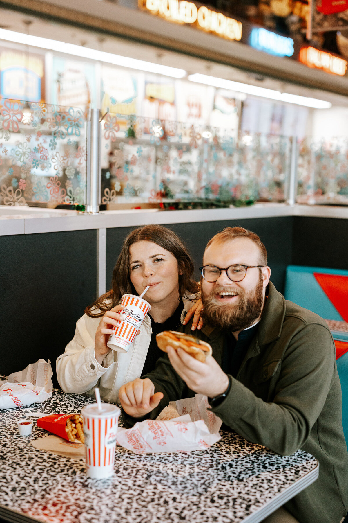 creative fun chicago flash engagement photos at Portillos Hotdogs-18-ed-lucy