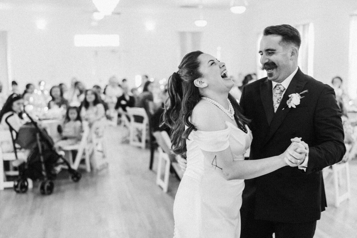 first-dance-wedding-reception-laughing