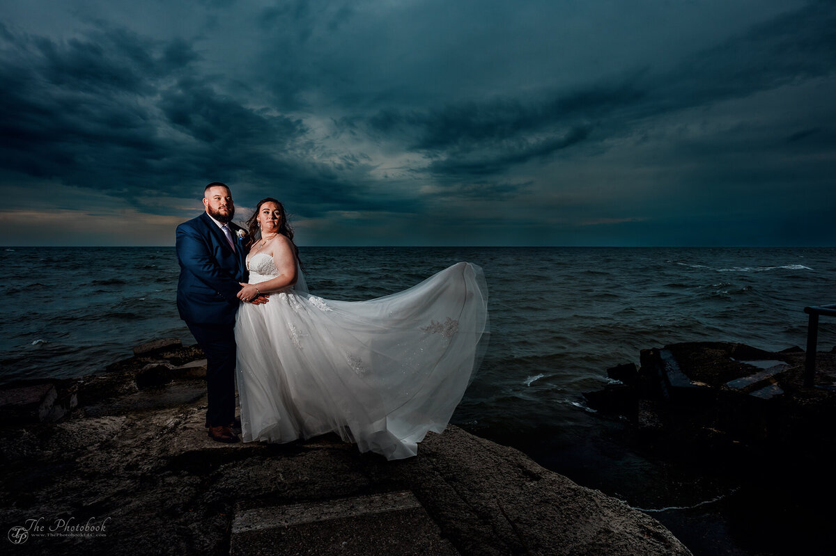 TP6_5135-Lake Erie-Wedding-storm clouds-water-bride-groom