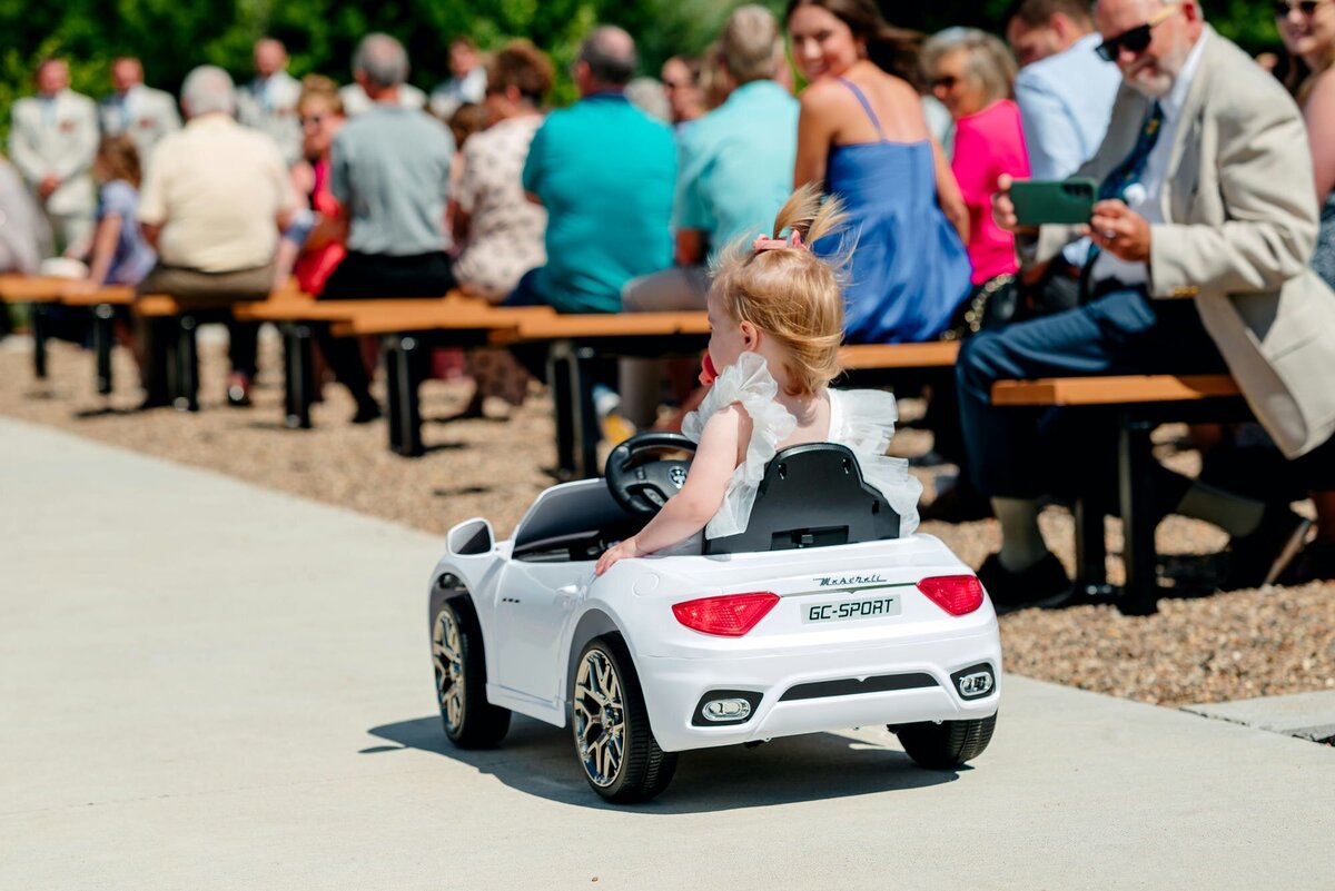 flower-girl-driving-car