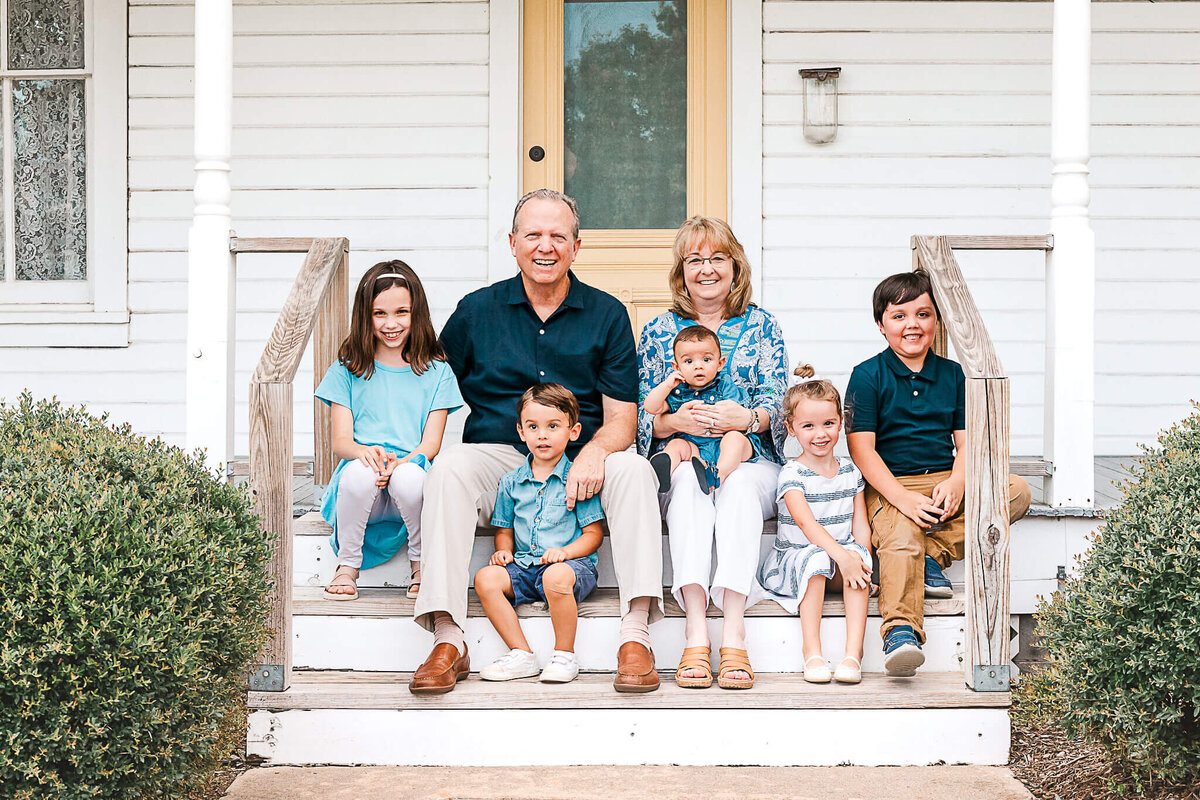 Grandparents and their grandchildren on steps