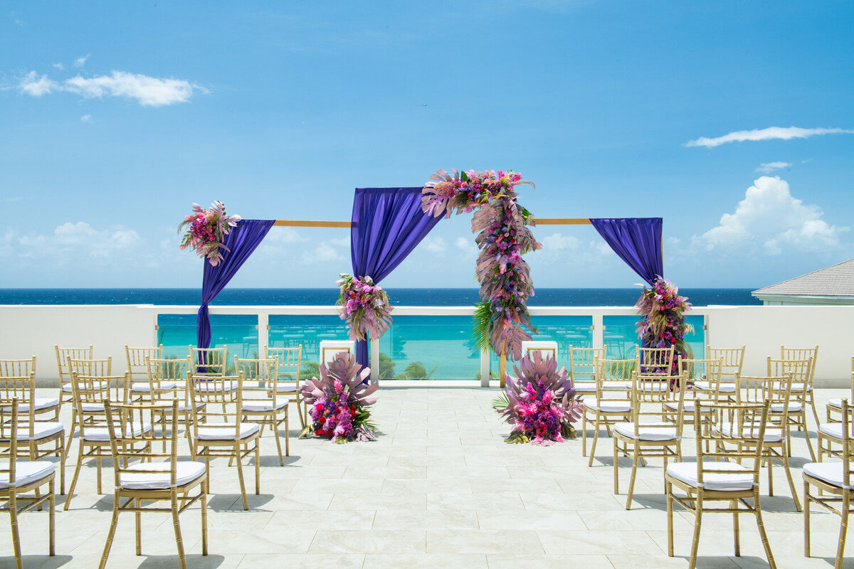 Colorful beach wedding ceremony set-up