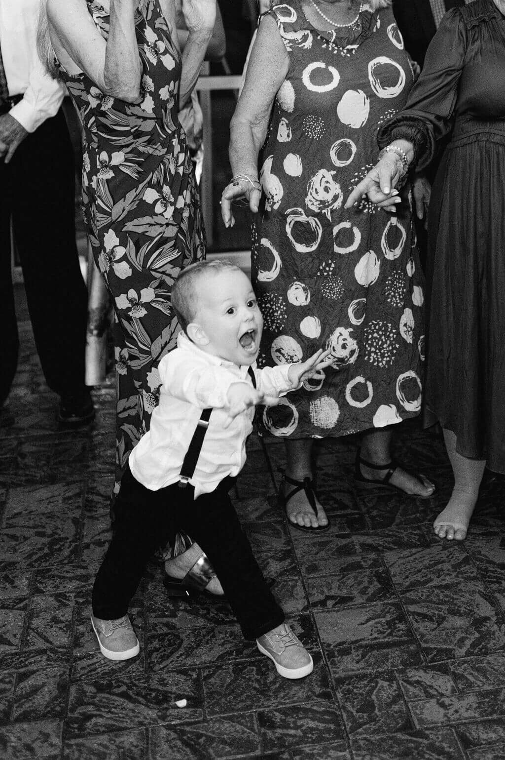 A little boy dancing at a wedding in DC