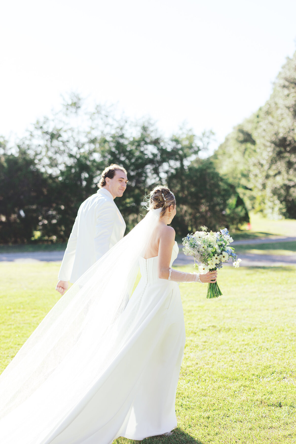 Bride and groom walk down the aisle after wedding in Charleston, SC
