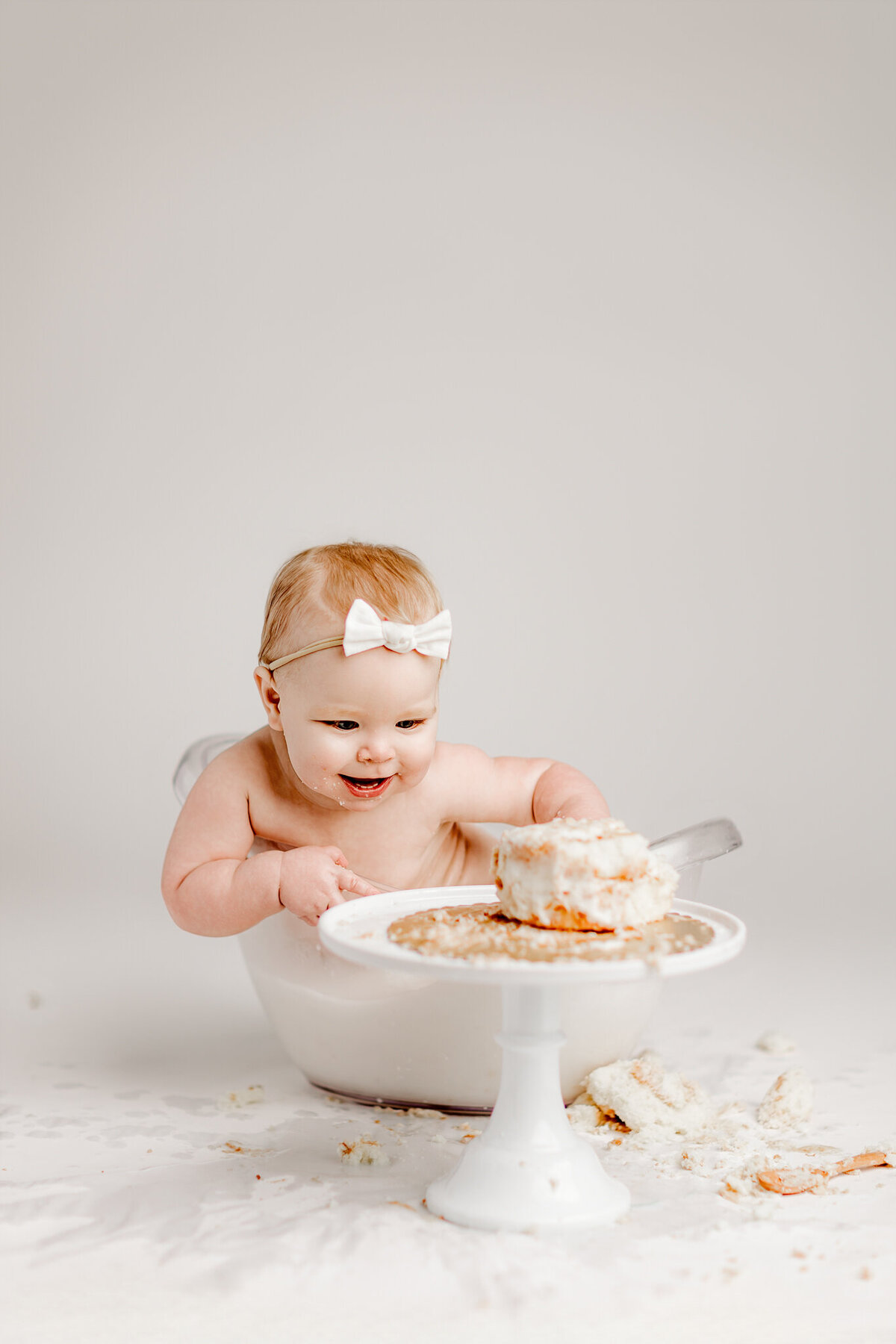 NWA cake smash photographer, milestone portrait session, baby birthday photoshoot Northwest Arkansas, best cake smash photography near me Fayetteville AR