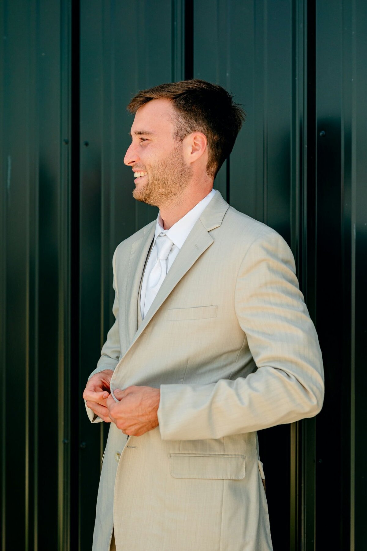 groom-laughs-outside