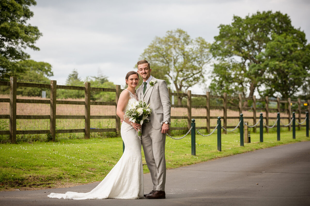 Bride and Groom portrait in grounds of Manor Parc Hotel