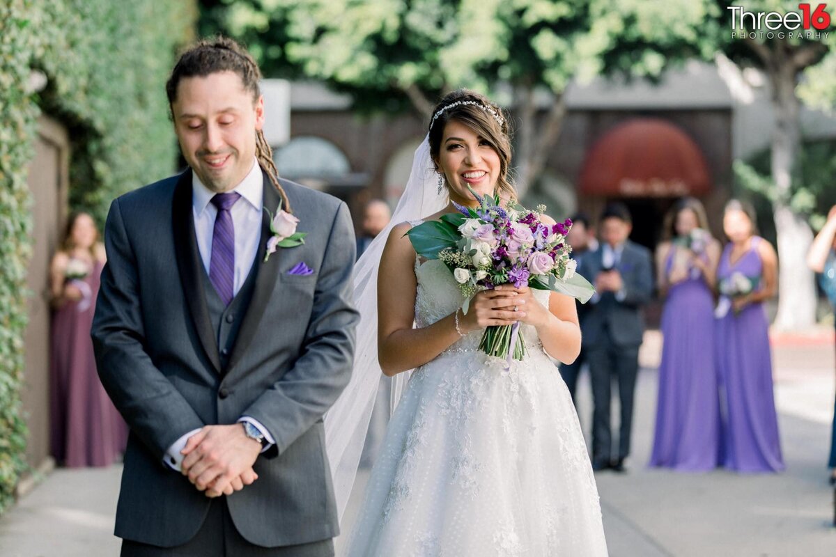 Bride sneaks up to the Groom for a First Look