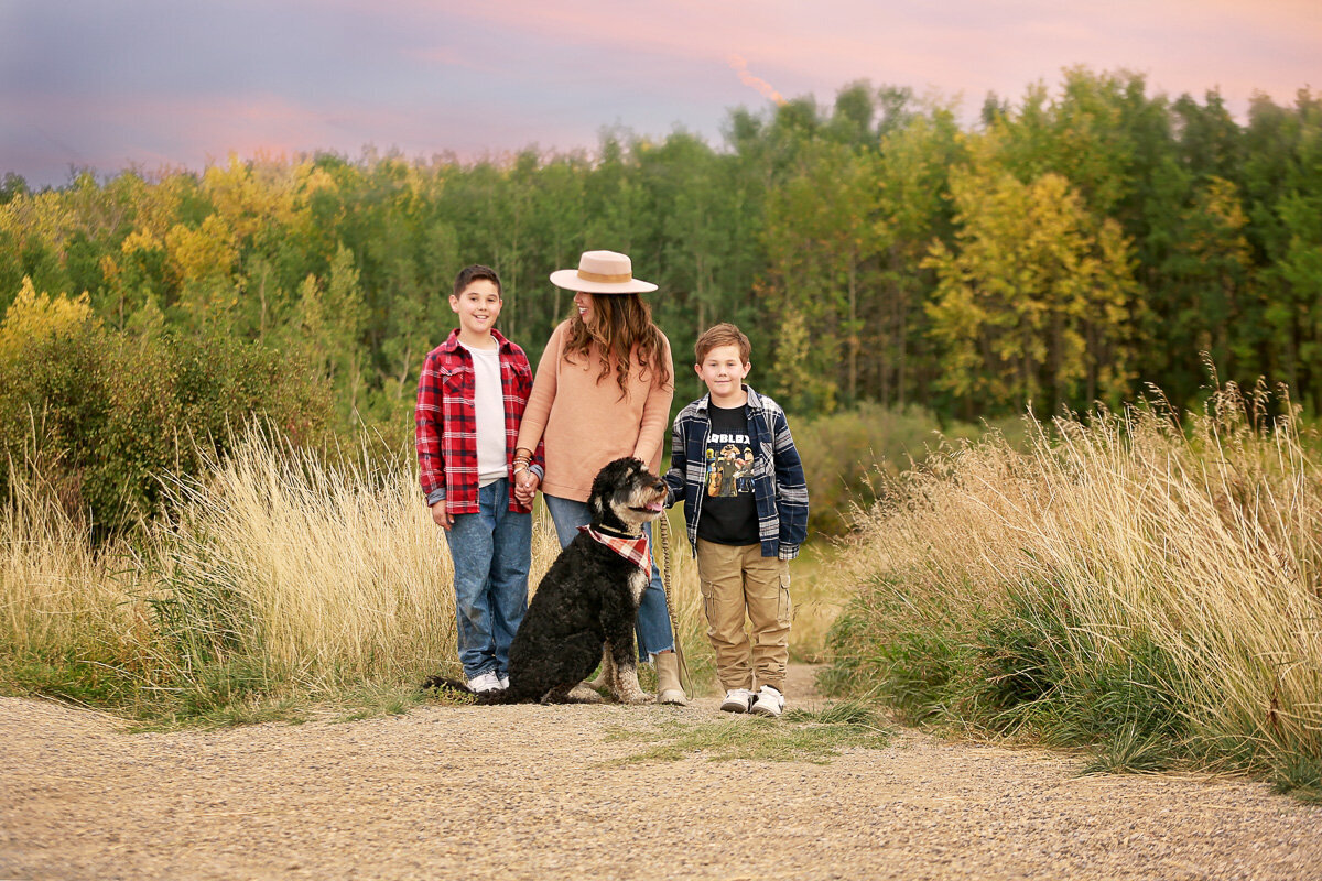 family-with-dog-in-nose-hill-park