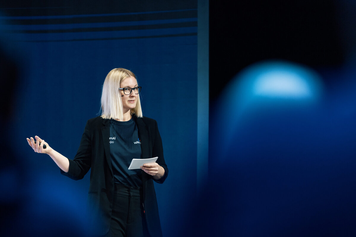 Jenny Moran captivates the audience with actionable communication insights during her presentation.

