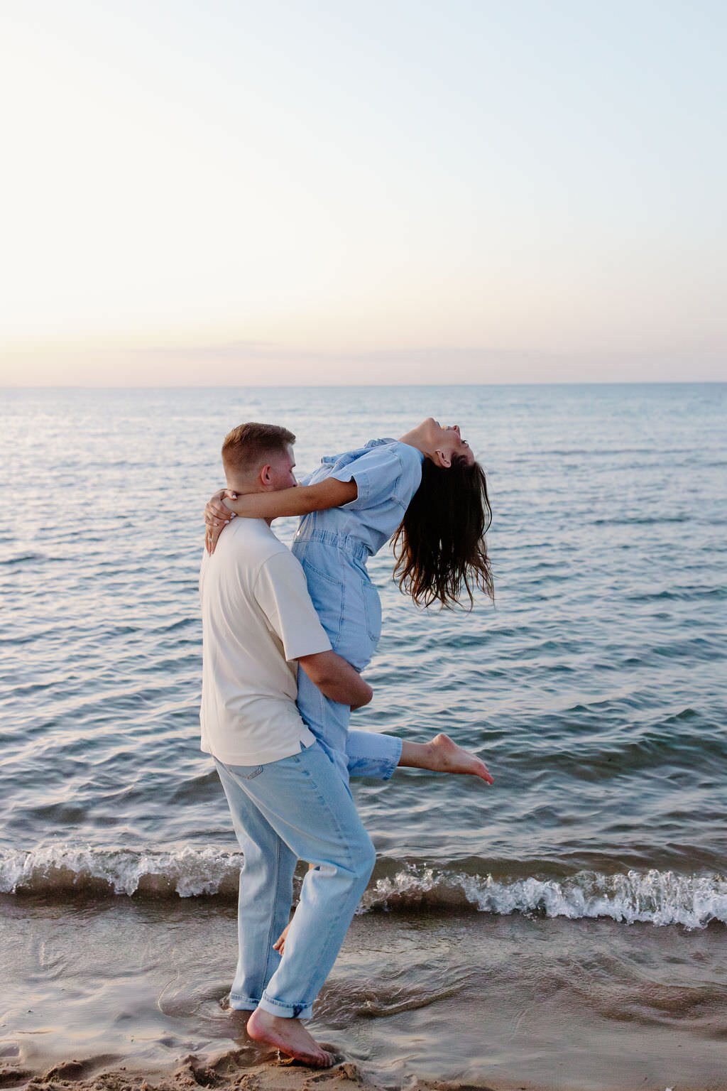 An engagement photography session at The Wrigley Building and North Ave Beach in Chicago, Illinois - 36