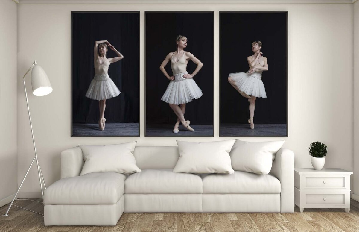 photos of ballerina in large frames on wall