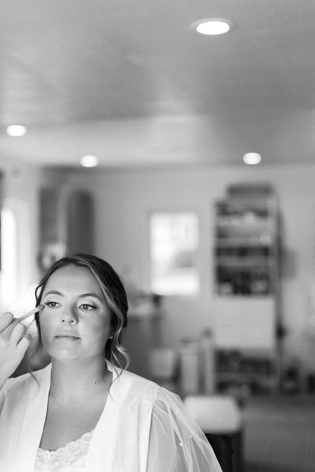 bride-getting-makeup-done