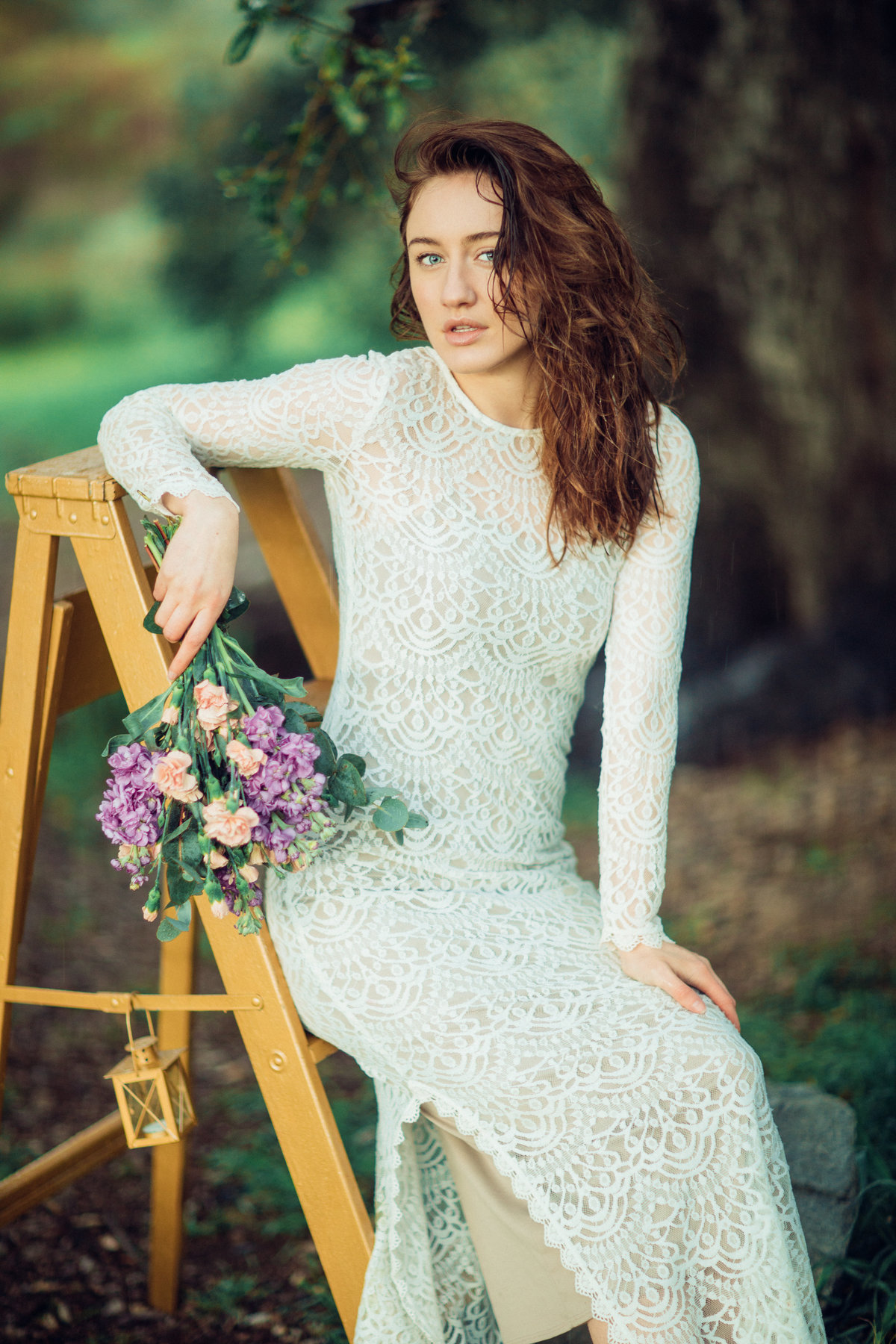 Portrait Photo Of Young Woman Seated On a Ladder Los Angeles