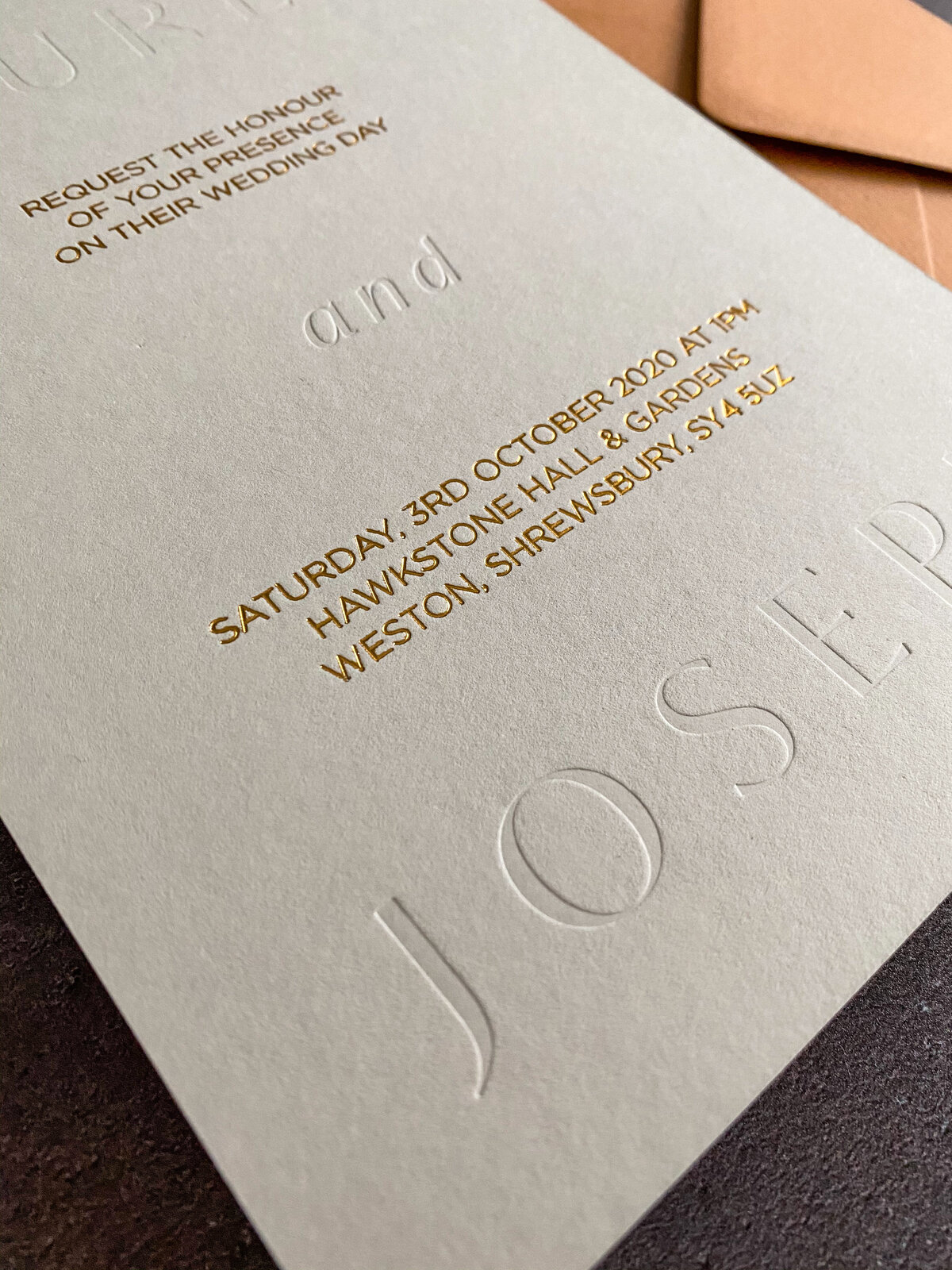 Letter pressed and gold foiled invitation