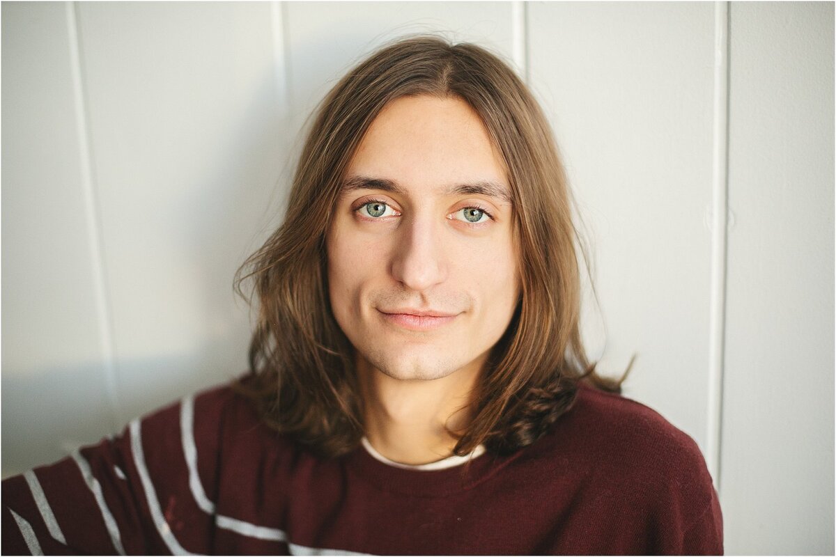 studio-senior-pictures-of-teen-with-striped-maroon-sweater