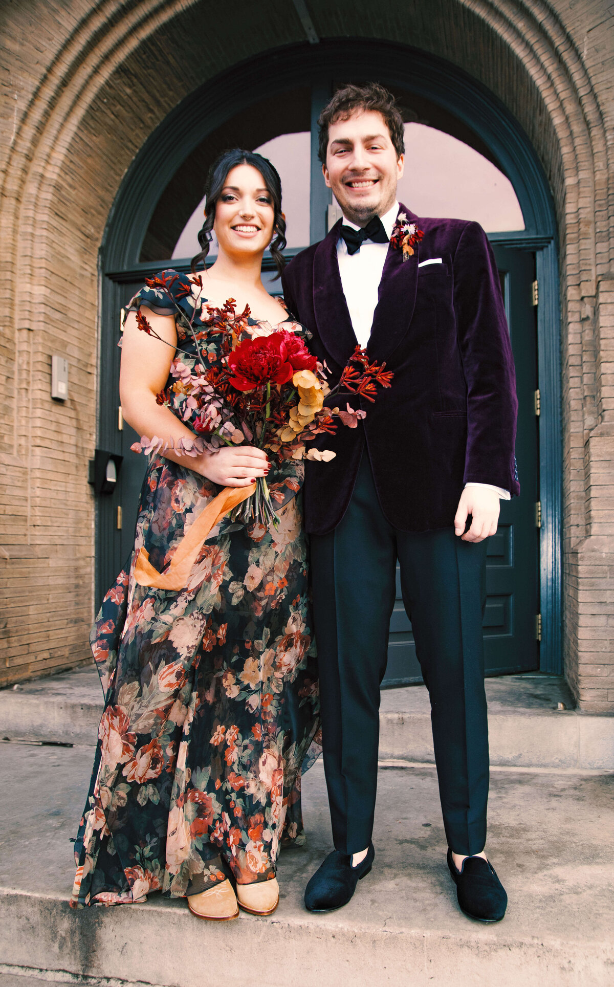 Wedding portraits outside of The Divine Lorraine Hotel in Philadelphia