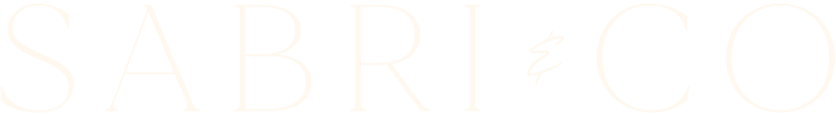 "Sabri & Co" logo written in an elegant, all-caps serif font with a handwritten & sign.