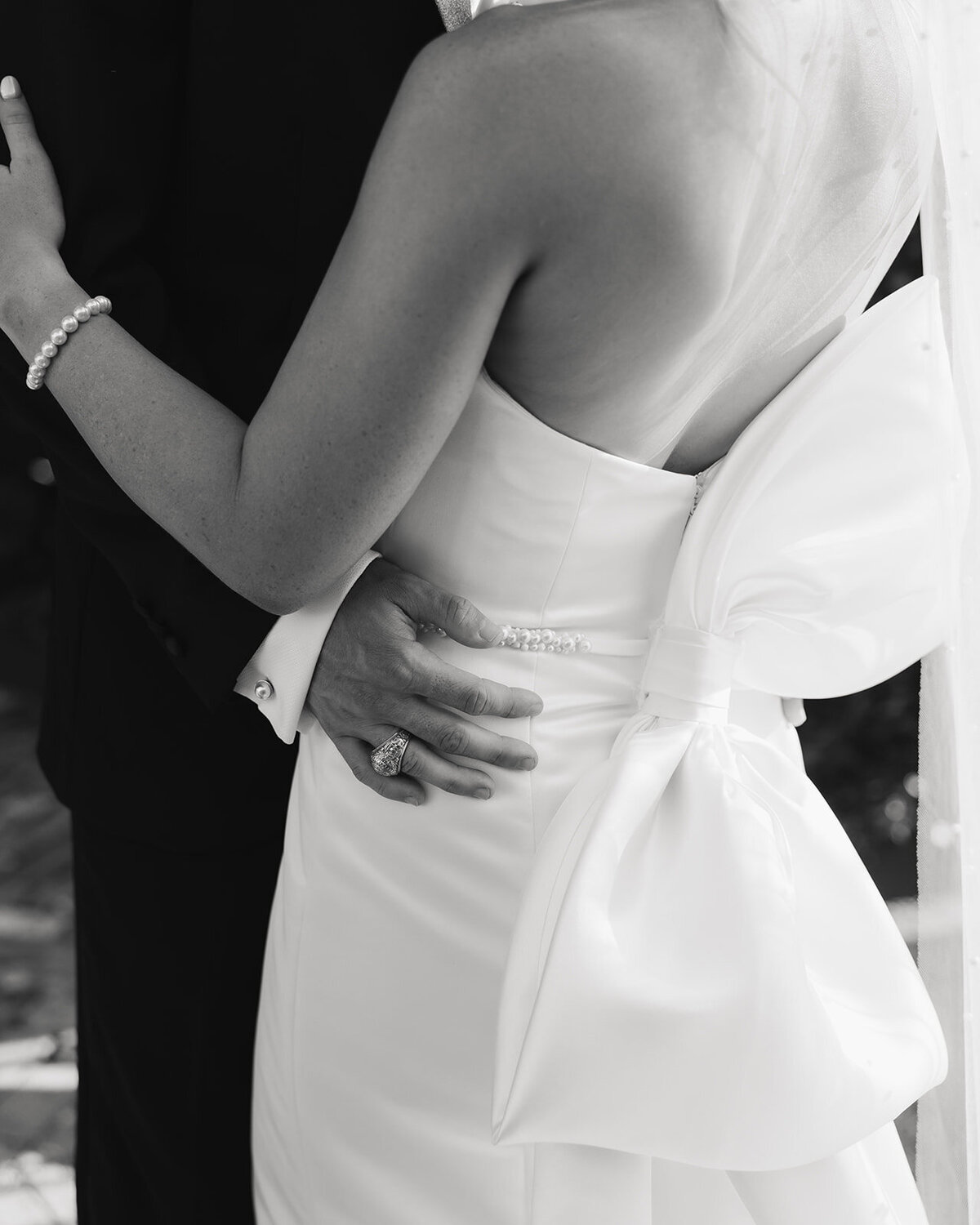 groom holds bride